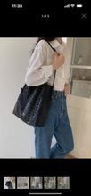 Woven black shoulder bag