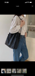 Woven black shoulder bag